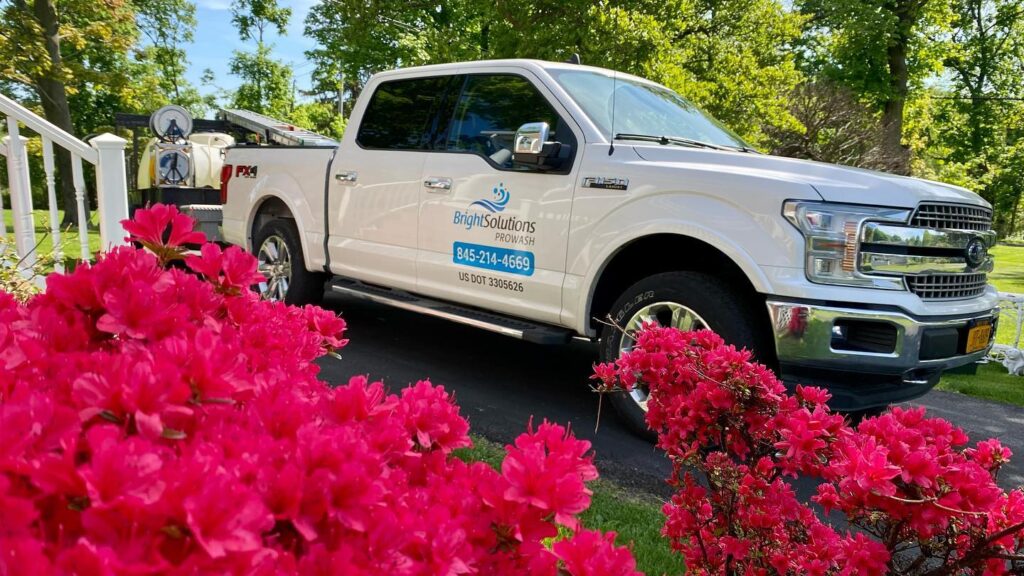 Bright Solutions ProWash pressure washing truck parked at a residential property in Hudson Valley, NY for exterior cleaning service.