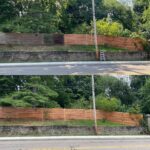 Before and after image of Bright Solutions ProWash soft washing a wooden fence in Beacon, NY to remove mold, dirt, and algae buildup.