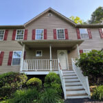 Clean residential house exterior after professional soft washing by Bright Solutions ProWash in Hudson Valley